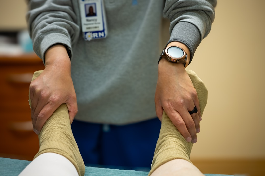 A nurse checks my circulation and pulse in my feet before taking me back for knee replacement surgery (right knee) at Portneuf Medical Center in Pocatello, Idaho, on April 28, 2025.